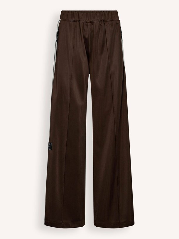 Ontdek de Geweven track broek met bies van Haute L'Amitié in de kleur donkerbruin bij Orangebag. Op werkdagen voor 21:45 besteld, morgen in huis.
