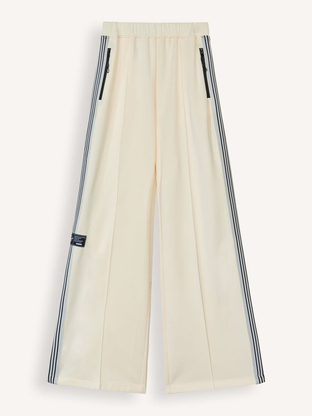 Ontdek de Geweven track broek met bies van Haute L'Amitié in de kleur crème bij Orangebag. Op werkdagen voor 21:45 besteld, morgen in huis.