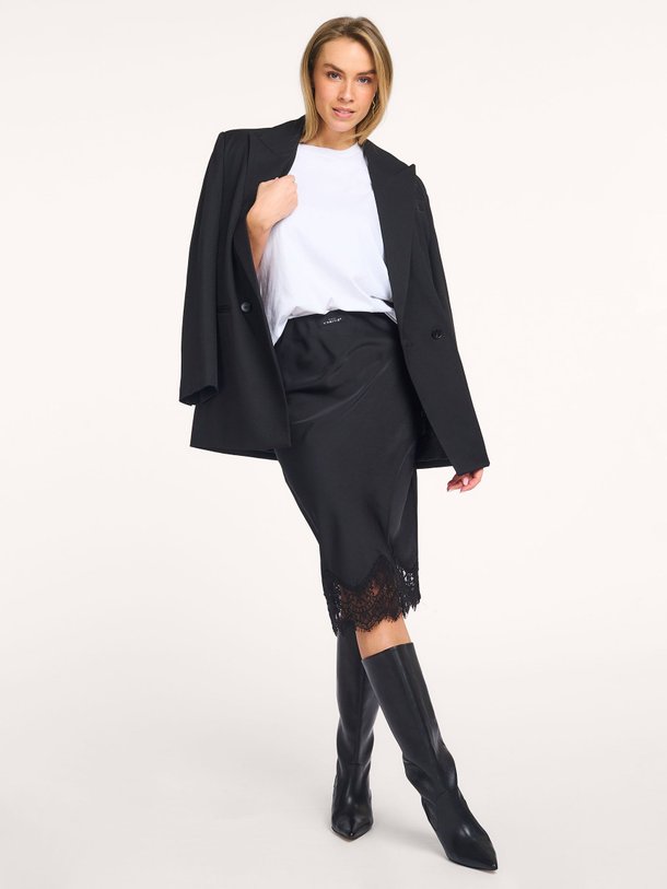 Ontdek de Naomi geweven rok met kant van Haute L'Amitié in de kleur zwart bij Orangebag. Op werkdagen voor 21:45 besteld, morgen in huis.