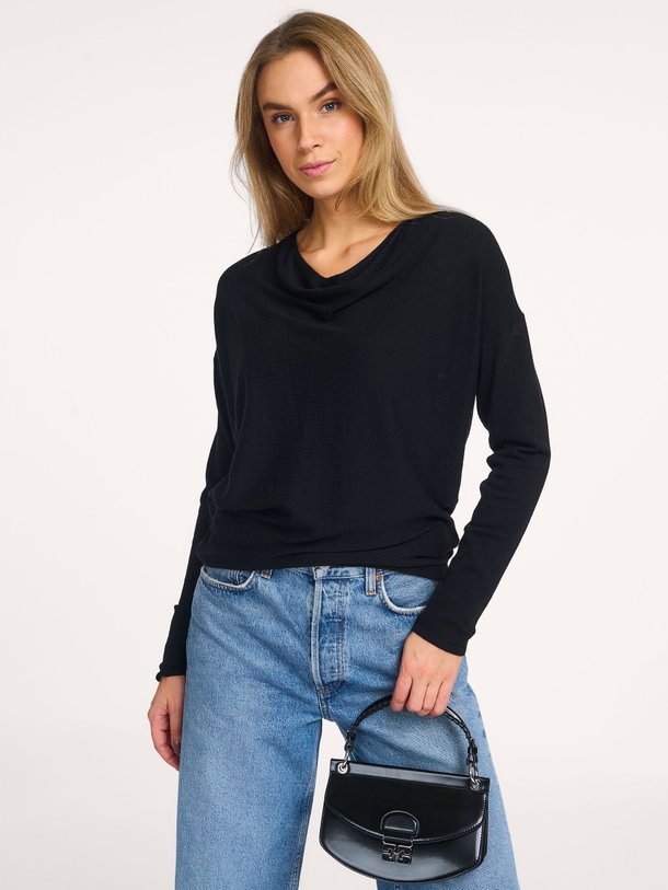 Ontdek de Polly wolmix top van My Essential Wardrobe in de kleur zwart bij Orangebag. Op werkdagen voor 21:45 besteld, morgen in huis.