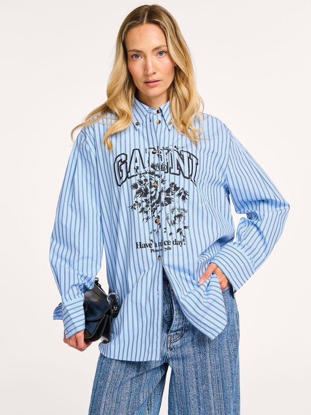 Ontdek de Organic cotton gestreepte blouse met print van Ganni bij Orangebag. Op werkdagen voor 21:45 besteld, morgen in huis.