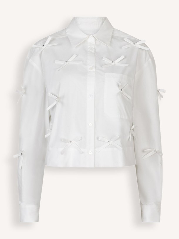 Ontdek de Hari Bows katoenen cropped blouse van Dante 6 in de kleur wit bij Orangebag. Op werkdagen voor 21:45 besteld, morgen in huis.