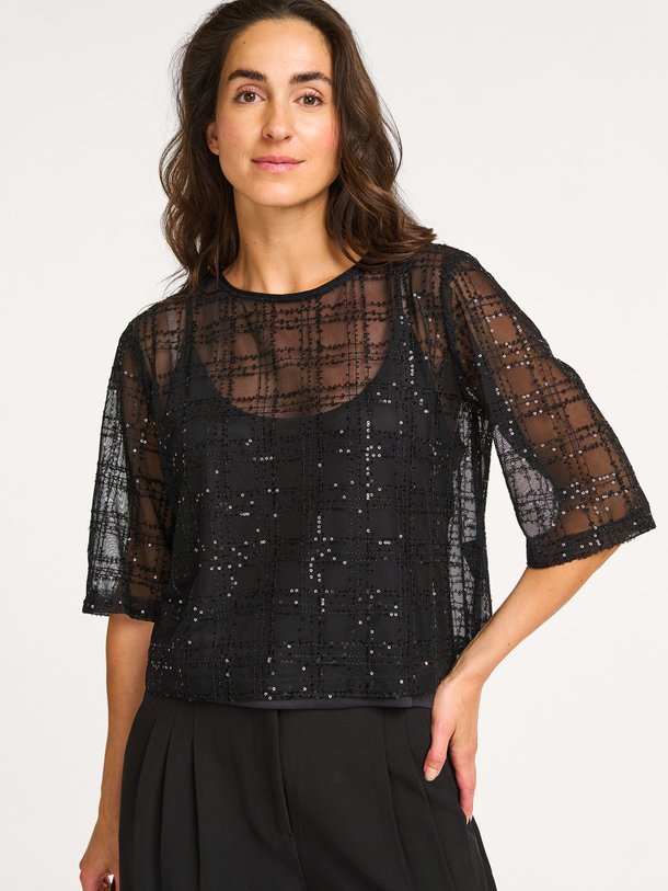 Ontdek de Pearleen mesh top met pailletten van Modstrom in de kleur zwart bij Orangebag. Op werkdagen voor 21:45 besteld, morgen in huis.