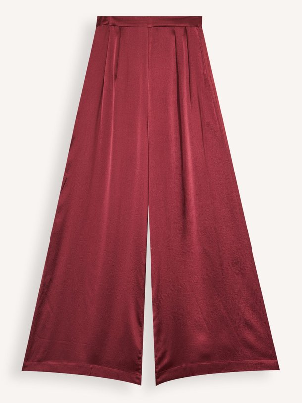 Ontdek de Swan zijden broek van Karma Koma in de kleur bordeauxrood bij Orangebag. Op werkdagen voor 21:45 besteld, morgen in huis.