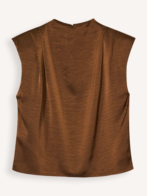 Ontdek de Cariño geweven satin-look top van Bolina Island in de kleur donkerbruin bij Orangebag. Op werkdagen voor 21:45 besteld, morgen in huis.
