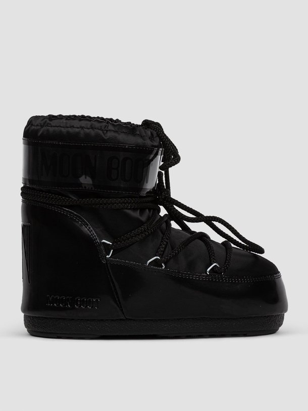Ontdek de Lage gewatteerde nylon snowboots van Moon Boot in de kleur zwart bij Orangebag. Op werkdagen voor 21:45 besteld, morgen in huis.