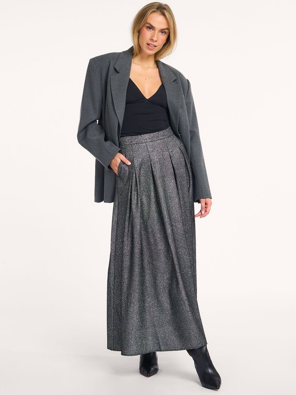 Ontdek de Shinmi geweven geplooide rok met glitters van Copenhagen Muse in de kleur zwart bij Orangebag. Op werkdagen voor 21:45 besteld, morgen in huis.