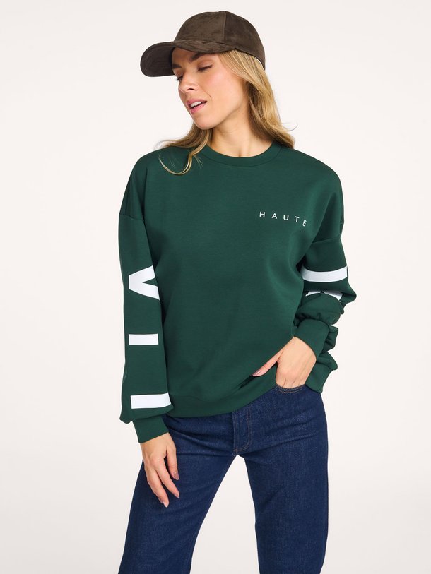 Ontdek de Katoenmix logo sweater van Haute L'Amitié in de kleur groen bij Orangebag. Op werkdagen voor 21:45 besteld, morgen in huis.