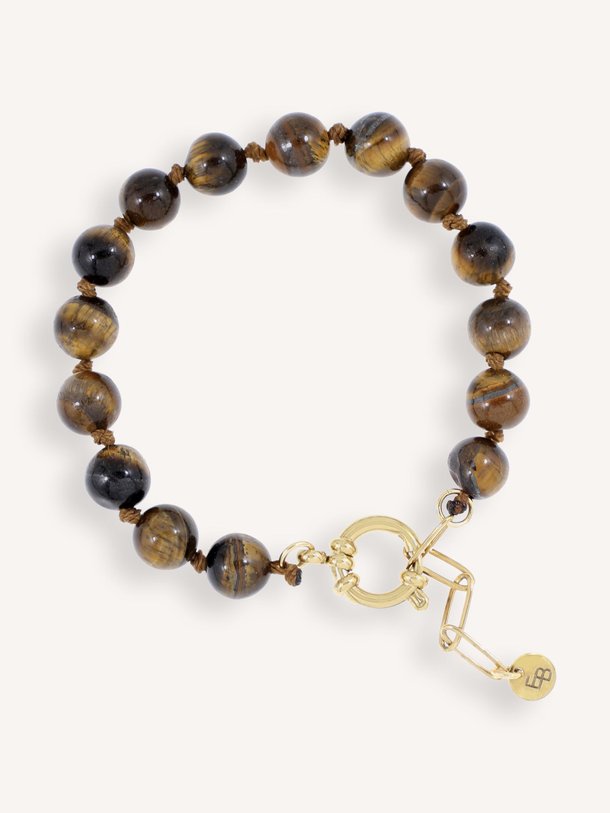 Ontdek de Vergulde armband met kralen van Ellen Beekmans in de kleur donkerbruin bij Orangebag. Op werkdagen voor 21:45 besteld, morgen in huis.