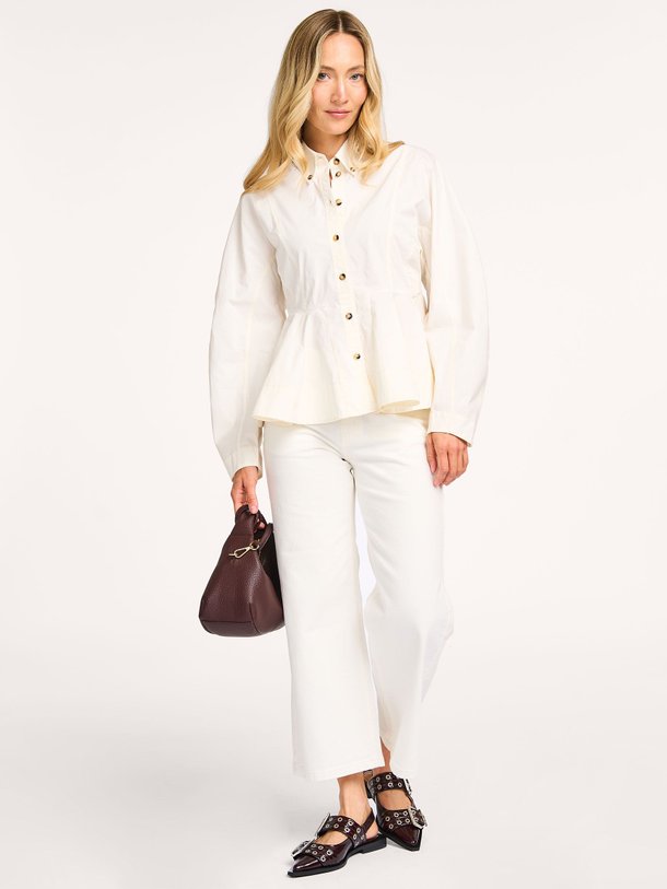 Ontdek de Organic cotton peplum blouse van Ganni in de kleur off-white bij Orangebag. Op werkdagen voor 21:45 besteld, morgen in huis.