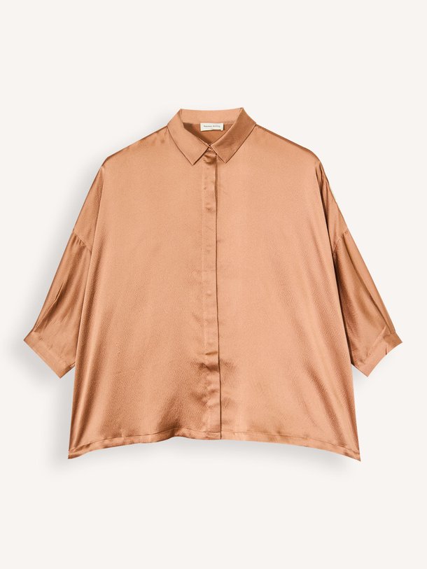Ontdek de Manon zijden blouse van Karma Koma in de kleur brons bij Orangebag. Op werkdagen voor 21:45 besteld, morgen in huis.