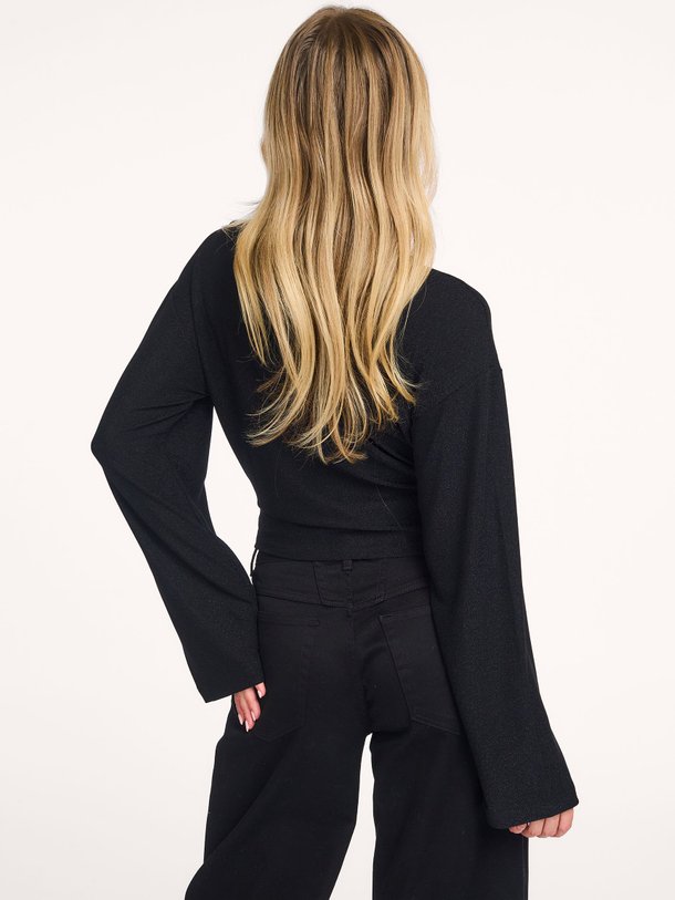 Ontdek de Noemia jersey top met lurex van Club L`avenir in de kleur zwart bij Orangebag. Op werkdagen voor 21:45 besteld, morgen in huis.