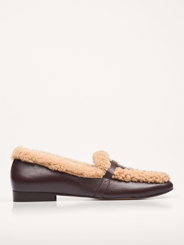 Ontdek de Daphne lederen shearling loafers van Toral in de kleur donkerbruin bij Orangebag. Op werkdagen voor 21:45 besteld, morgen in huis.