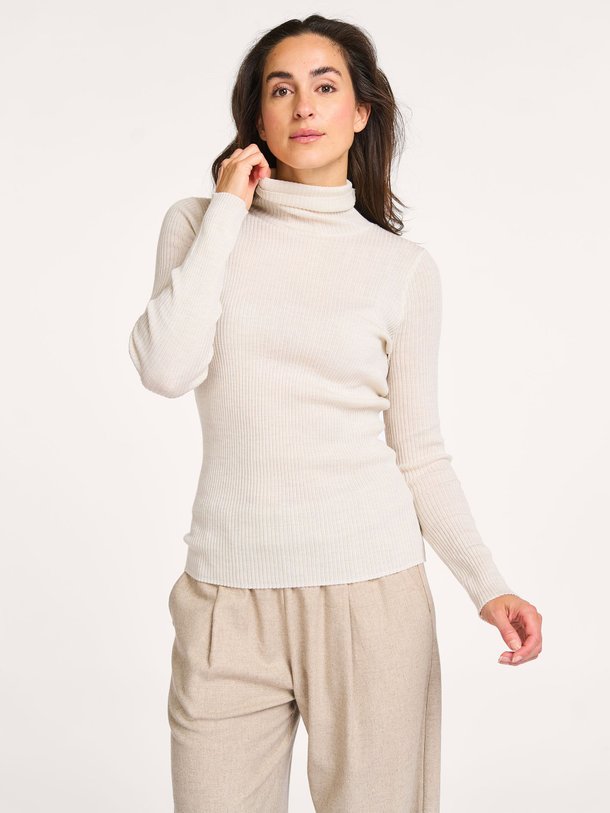 Ontdek de Wollen coltui van No Man's Land in de kleur crème bij Orangebag. Op werkdagen voor 21:45 besteld, morgen in huis.