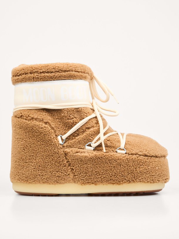 Ontdek de Lage gewatteerde teddy snowboots van Moon Boot in de kleur camel bij Orangebag. Op werkdagen voor 21:45 besteld, morgen in huis.