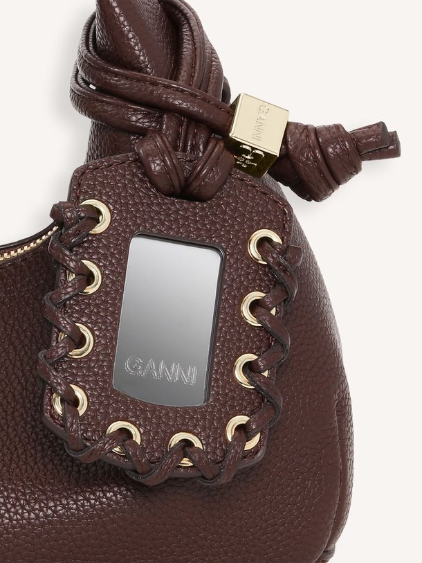 Ontdek de Hobo mini crossbody bag van Ganni in de kleur aubergine bij Orangebag. Op werkdagen voor 21:45 besteld, morgen in huis.
