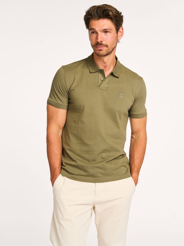 Ontdek de Passenger katoenmix piqué polo van Boss in de kleur donkergroen bij Orangebag. Op werkdagen voor 21:45 besteld, morgen in huis.