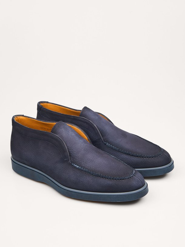 Ontdek de Loda lederen instappers van Magnanni in de kleur donkerblauw bij Orangebag. Op werkdagen voor 21:45 besteld, morgen in huis.