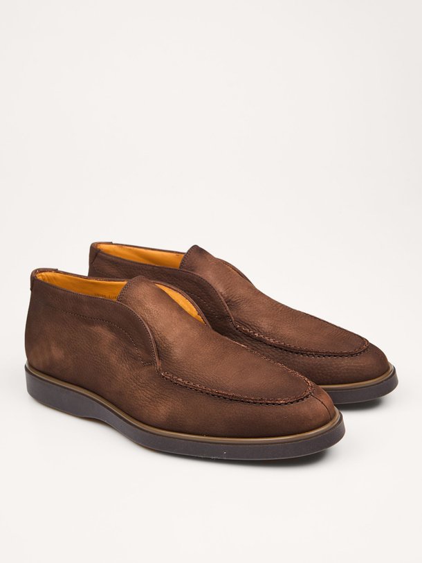 Ontdek de Loda lederen instappers van Magnanni in de kleur donkerbruin bij Orangebag. Op werkdagen voor 21:45 besteld, morgen in huis.