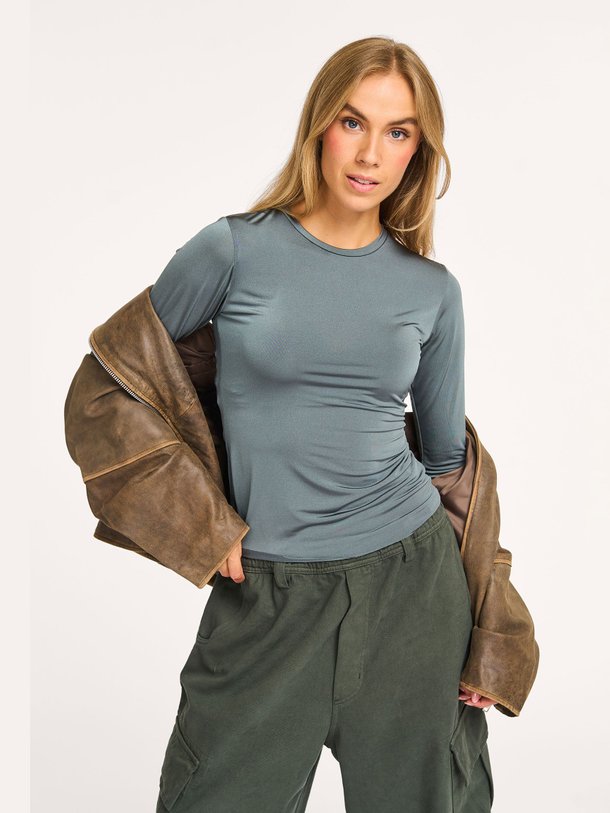 Ontdek de Lee jersey glanzende top van Sea Me Happy in de kleur groen bij Orangebag. Op werkdagen voor 21:45 besteld, morgen in huis.