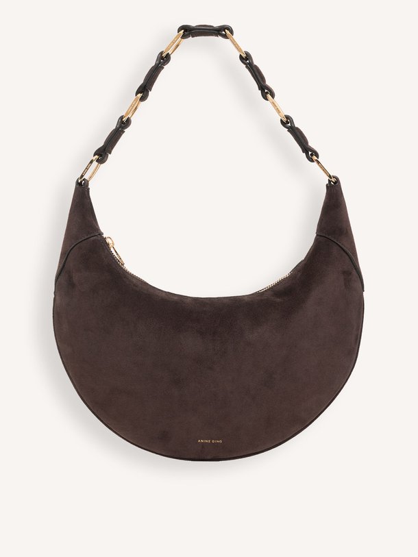 Ontdek de Kate Hobo suède schoudertas van Anine Bing in de kleur donkerbruin bij Orangebag. Op werkdagen voor 21:45 besteld, morgen in huis.