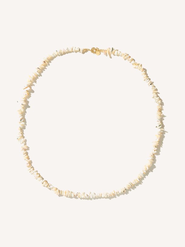 Ontdek de Cooper schelpen halsketting van Mimi et Toi in de kleur beige bij Orangebag. Op werkdagen voor 21:45 besteld, morgen in huis.