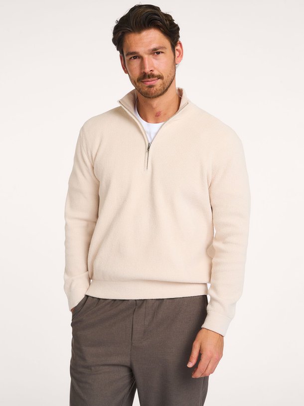 Ontdek de Danny ribgebreide trui van NN.07 in de kleur crème bij Orangebag. Op werkdagen voor 21:45 besteld, morgen in huis.