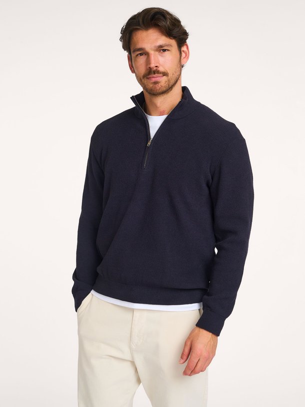 Ontdek de Danny ribgebreide trui van NN.07 in de kleur donkerblauw bij Orangebag. Op werkdagen voor 21:45 besteld, morgen in huis.