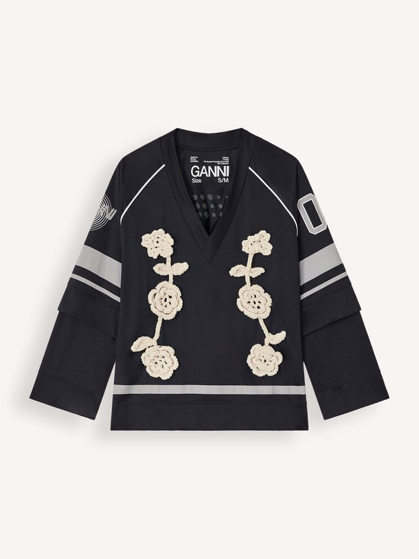 Ontdek de Jersey top met print van Ganni in de kleur zwart bij Orangebag. Op werkdagen voor 21:45 besteld, morgen in huis.