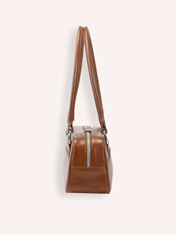 Ontdek de Nomi mini lederen schoudertas van Vagabond Shoemakers in de kleur bruin bij Orangebag. Op werkdagen voor 21:45 besteld, morgen in huis.
