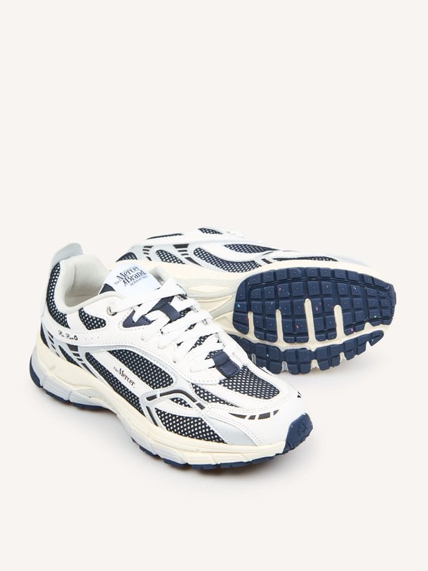 Ontdek de The Re-Run lederen sneakers met mesh van Mercer Amsterdam in de kleur donkerblauw bij Orangebag. Op werkdagen voor 21:45 besteld, morgen in huis.