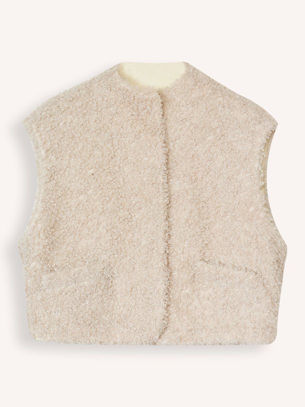 Ontdek de Joshie geweven teddy gilet van Knit-ted in de kleur crème bij Orangebag. Op werkdagen voor 21:45 besteld, morgen in huis.