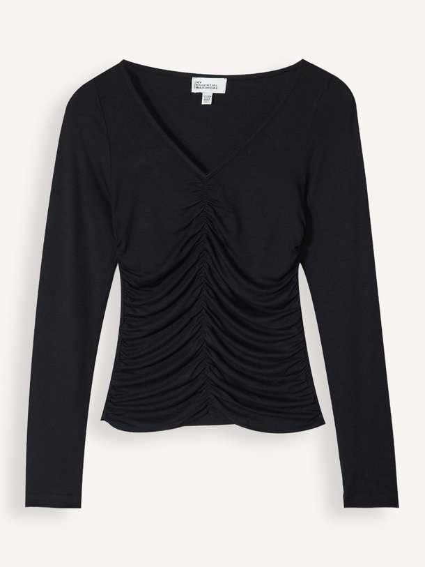 Ontdek de Giggo viscosemix top van My Essential Wardrobe in de kleur zwart bij Orangebag. Op werkdagen voor 21:45 besteld, morgen in huis.
