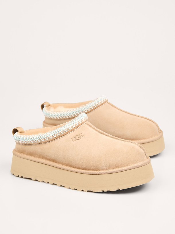 Ontdek de Tazz suède instappers van Ugg in de kleur zand bij Orangebag. Op werkdagen voor 21:45 besteld, morgen in huis.