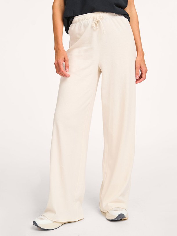 Ontdek de Ykobow katoenen joggingbroek met print van American Vintage in de kleur crème bij Orangebag. Op werkdagen voor 21:45 besteld, morgen in huis.