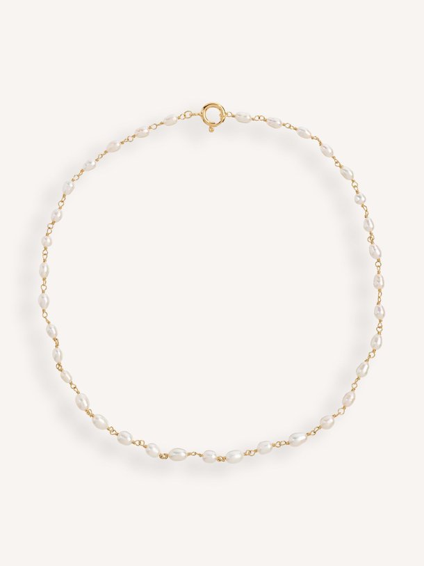 Ontdek de Clutching vergulde halsketting met parels van Anna + Nina in de kleur goudkleur bij Orangebag. Op werkdagen voor 21:45 besteld, morgen in huis.