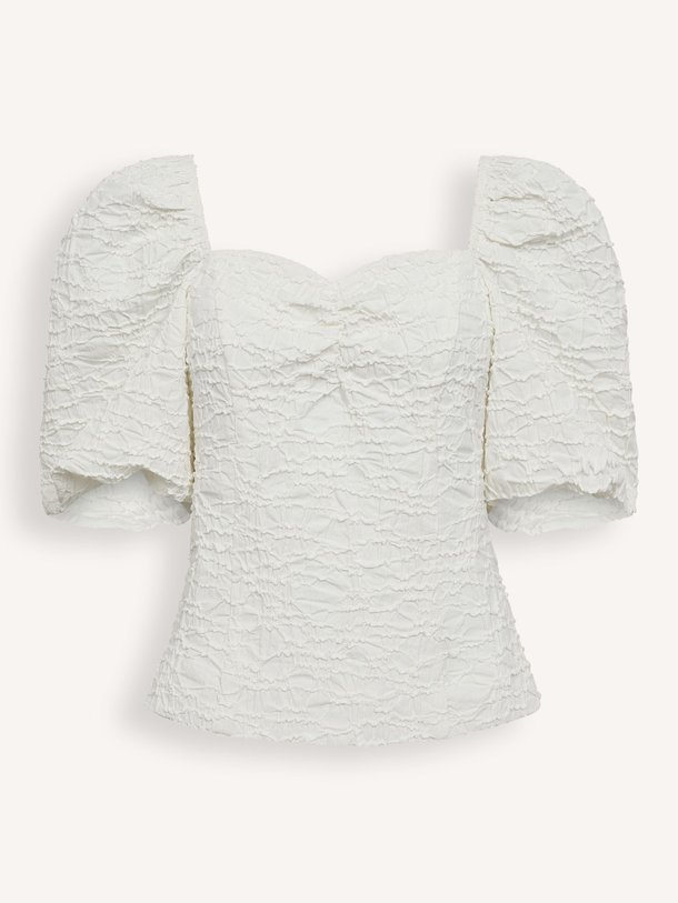 Ontdek de Dazzy geweven top met structuur van Haute L'Amitié in de kleur off-white bij Orangebag. Op werkdagen voor 21:45 besteld, morgen in huis.