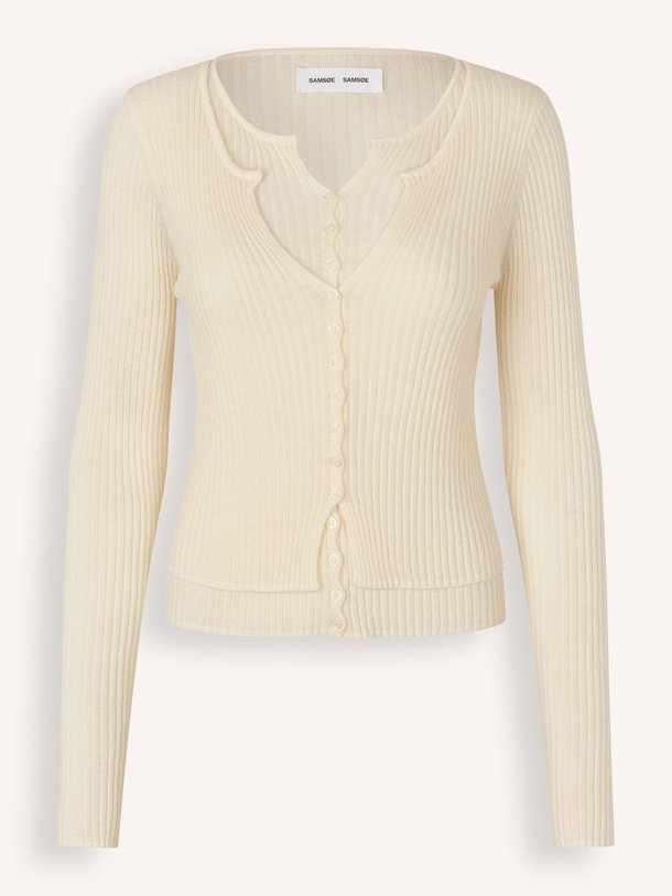 Ontdek de Sajose merino wollen rib vest van Samsoe Samsoe in de kleur crème bij Orangebag. Op werkdagen voor 21:45 besteld, morgen in huis.
