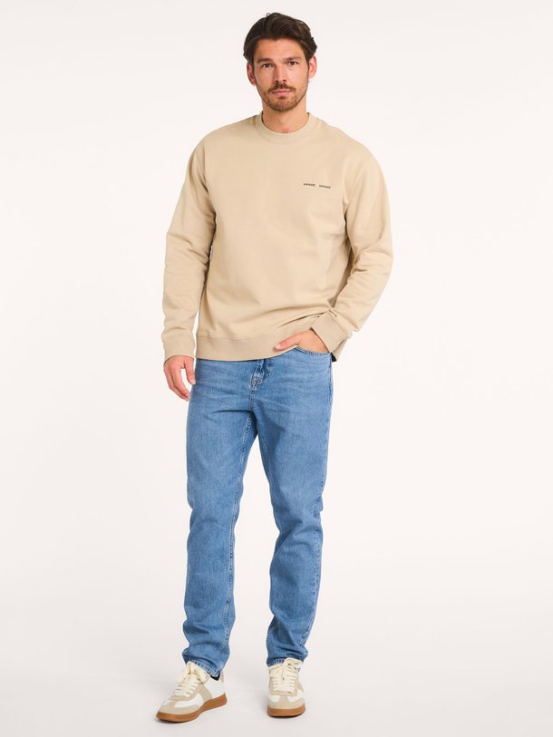 Ontdek de Norsbro organic cotton sweater van Samsoe Samsoe in de kleur zand bij Orangebag. Op werkdagen voor 21:45 besteld, morgen in huis.