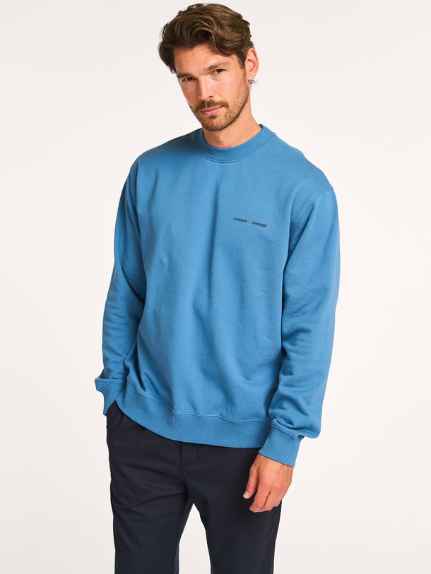 Ontdek de Norsbro organic cotton logo sweater van Samsoe Samsoe in de kleur blauw bij Orangebag. Op werkdagen voor 21:45 besteld, morgen in huis.