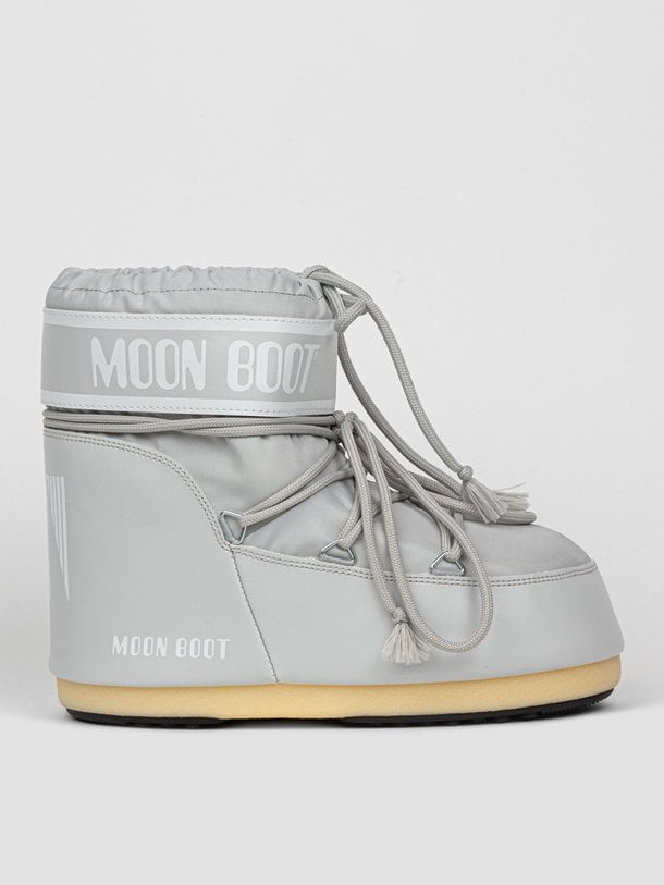 Ontdek de Lage gewatteerde nylon snowboots van Moon Boot in de kleur lichtgrijs bij Orangebag. Op werkdagen voor 21:45 besteld, morgen in huis.