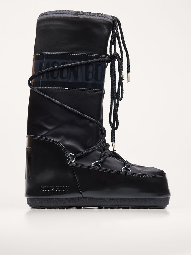 Ontdek de Hoge gewatteerde nylon snowboots van Moon Boot in de kleur zwart bij Orangebag. Op werkdagen voor 21:45 besteld, morgen in huis.