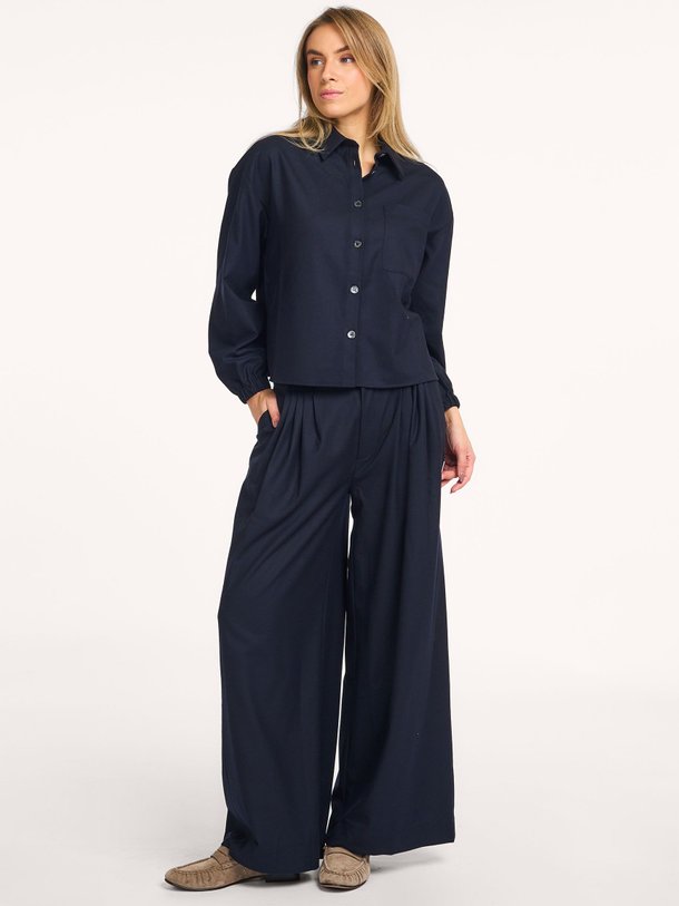 Ontdek de Perce viscosemix wide leg pantalon van Ruby Tuesday in de kleur donkerblauw bij Orangebag. Op werkdagen voor 21:45 besteld, morgen in huis.