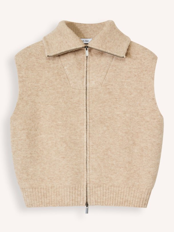 Ontdek de May merino wolmix gemêleerd vest van Knit-ted in de kleur zand bij Orangebag. Op werkdagen voor 21:45 besteld, morgen in huis.