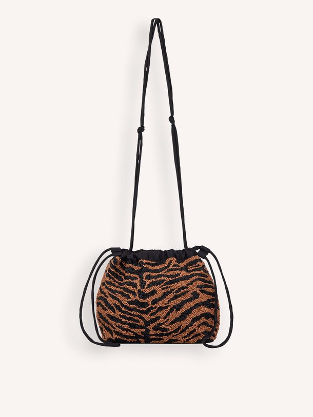 Ontdek de Tigarea Giana geweven schoudertas met kralen van Becksondergaard in de kleur bruin bij Orangebag. Op werkdagen voor 21:45 besteld, morgen in huis.