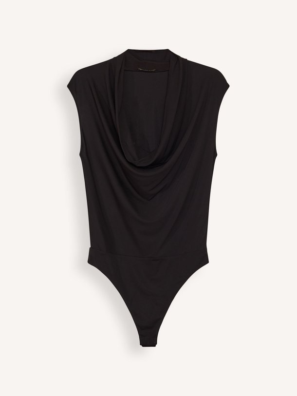 Ontdek de Jeanette viscosemix body van Anine Bing in de kleur zwart bij Orangebag. Op werkdagen voor 21:45 besteld, morgen in huis.