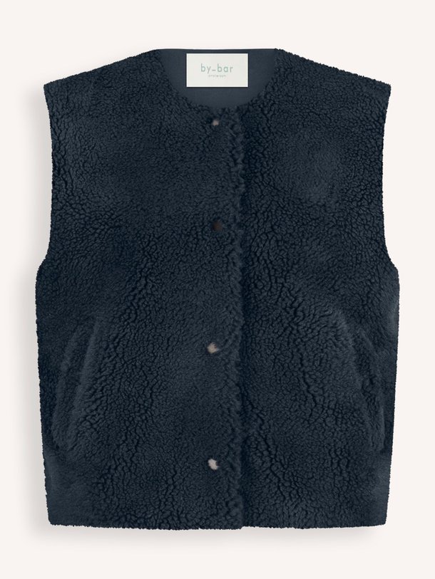 Ontdek de Noel geweven teddy gilet van By-Bar in de kleur donkerblauw bij Orangebag. Op werkdagen voor 21:45 besteld, morgen in huis.