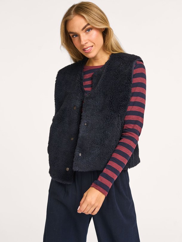 Ontdek de Noel geweven teddy gilet van By-Bar in de kleur donkerblauw bij Orangebag. Op werkdagen voor 21:45 besteld, morgen in huis.