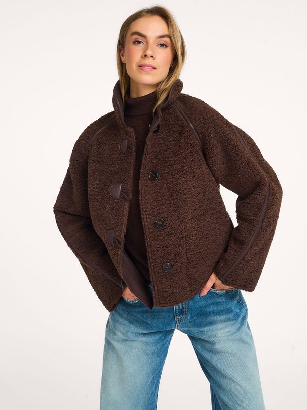 Ontdek de Leatherlook reversible jack van Frnch in de kleur donkerbruin bij Orangebag. Op werkdagen voor 21:45 besteld, morgen in huis.