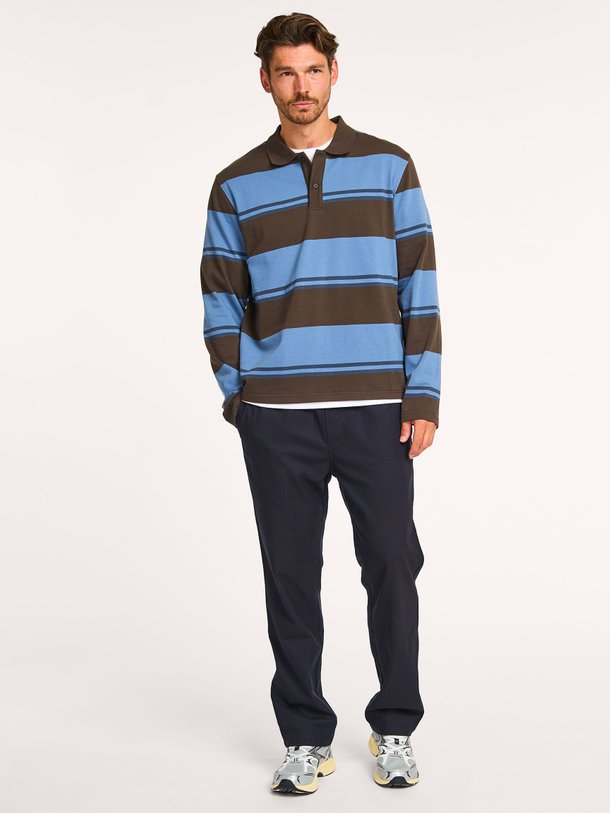 Ontdek de Sakevin organic cotton polo longsleeve van Samsoe Samsoe in de kleur blauw bij Orangebag. Op werkdagen voor 21:45 besteld, morgen in huis.